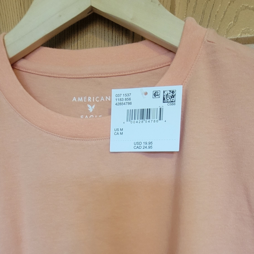 American Eagle Light Orange T-Shirt. New With Tags Size Medium.